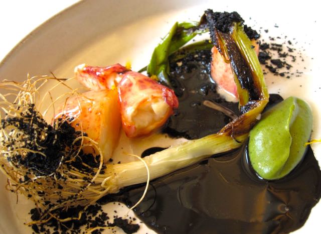 Lobster Poached with Leeks, Black Onion and Shellfish Bisque